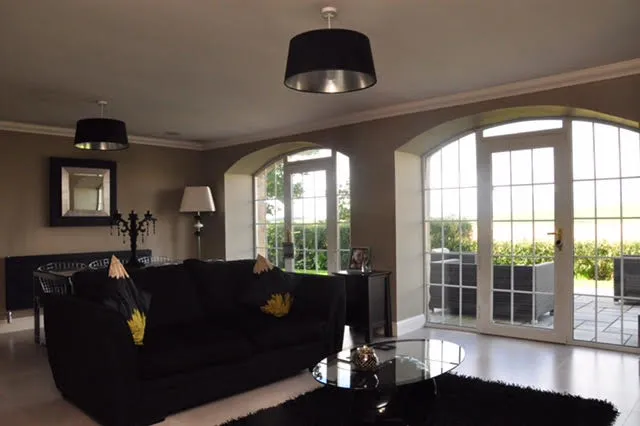 Feature wall with wallpaper hung by GL Decorating